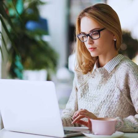 AI-free content writing service — human writer drafting original blog content by hand