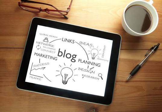 Outsource blog writing team researching and drafting content for a business, representing blog writing agency services, freelance blog writer evaluation, SEO blog content outsourcing, and human-written blog content built for measurable results.